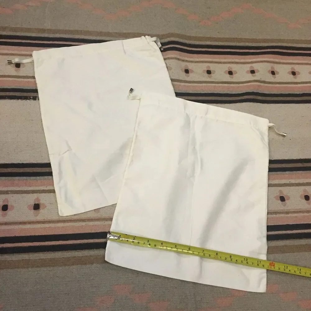 Two (2) Alexandre Birman soft white drawstring Dustbag 16” x 8” Garment